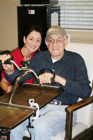 nurse and patient in rehab care smiling